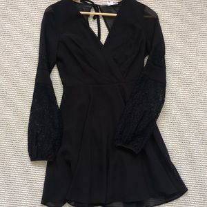 Little black dress with lace sleeves